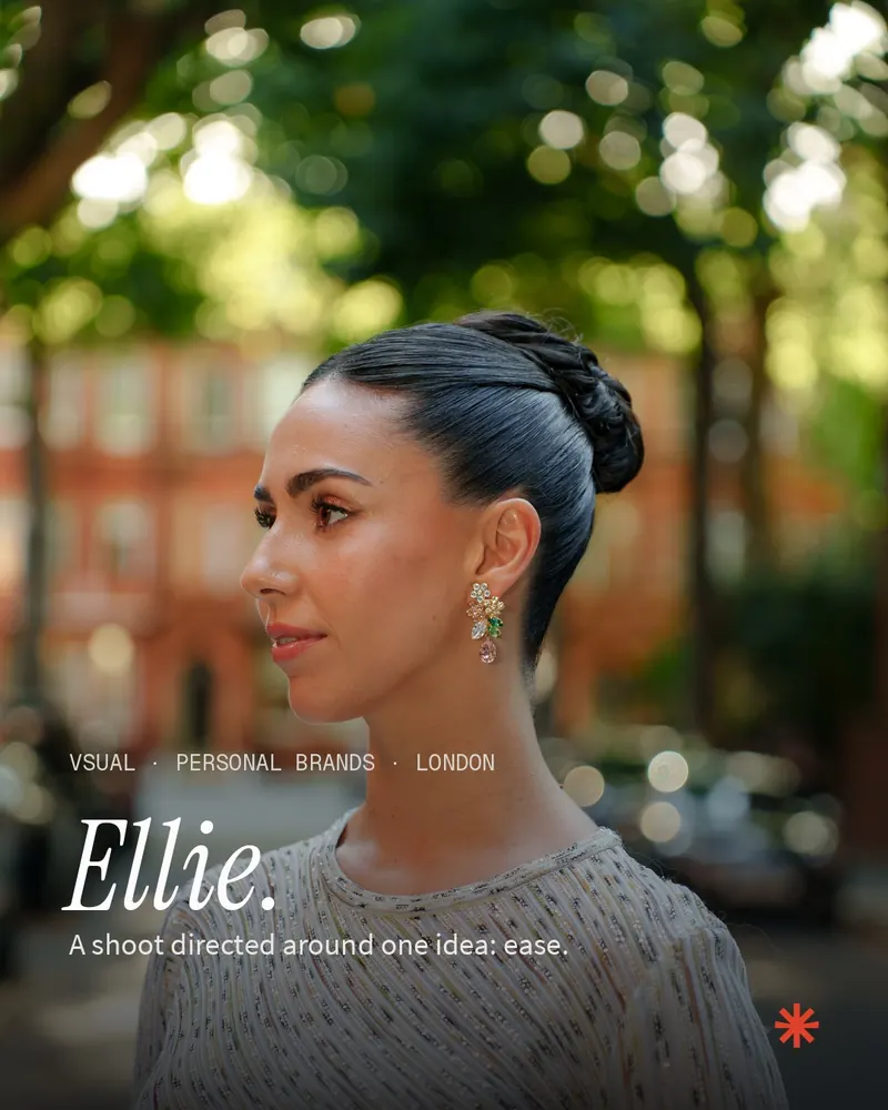 Profile portrait of Ellie Evelyn on a tree-lined London street, with the caption: Ellie. A shoot directed around one idea: ease.